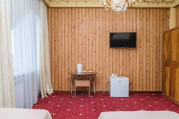 Фото номера Первая категория Стандарт 2-местный улучшенный с двумя односпальными кроватями Гостиница Легенда Байкала г. Листвянка 9