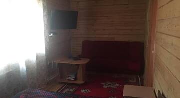 Фото номера Четырехместный номер с душем Гостиница Байкальский Уют г. Листвянка 7