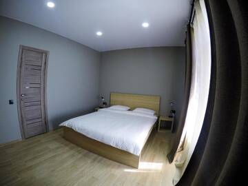 Фото номера Двухместный номер с 1 кроватью, вид на озеро Гостиница Guest house Ostrovskogo 11 г. Листвянка 3