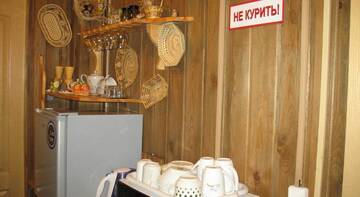 Фото номера Двухместный номер с 2 отдельными кроватями и общей ванной комнатой Гостиница Никола Отель г. Листвянка 12