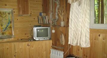 Фото номера Двухместный номер с 2 отдельными кроватями и общей ванной комнатой Гостиница Никола Отель г. Листвянка 9