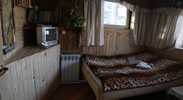 Фото номера Двухместный номер с 2 отдельными кроватями и общей ванной комнатой Гостиница Никола Отель г. Листвянка 5